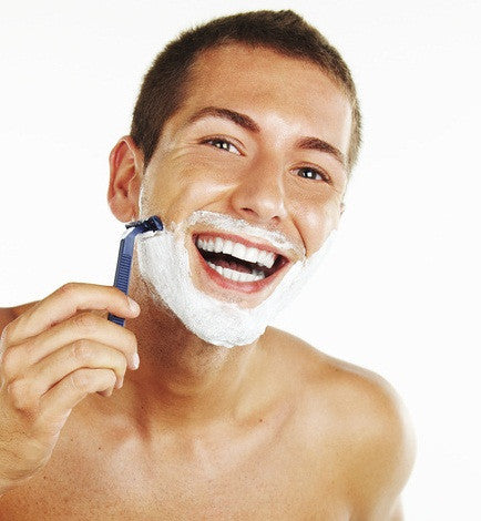 Man Shaving with mens shaving tips Men's Botanics Products